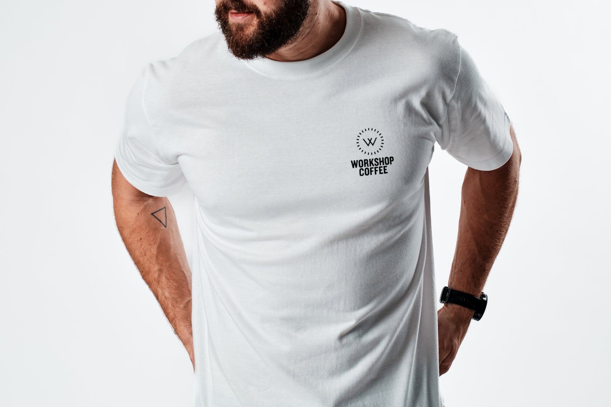 A heavyweight white unisex t-shirt adorned with a screen printed Workshop logo. Created with Japanese apparel brand United Athle.